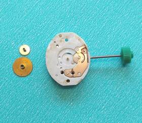 M653 Timex Quartz Movement For Parts Repair. Gear Train Moves Freely. Coil Bad