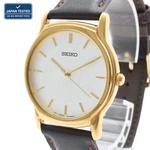 Seiko V701-A100 Quartz Dress Watch White Dial Gold Tone Case Leather Strap 33MM. Fixed Price $99.99.