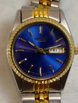 Vintage Seiko Blue Dial Women Oyster Watch. Gold Tone Bezel Day Date 7N83-0049. Fixed Price $125.00.