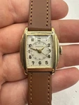 Vintage Men Longines Art Deco Tonneau Watch 10K Gold Filled Rare Stepped Case. Fixed Price $500.00.
