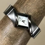 Pulsar Women VC10-X031 Assymetical Deco Silver Tone Quartz 22MM Watch 6 1/2". Fixed Price $53.95.