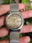 Vintage Orient Crystal Automatic Day-date Textured Dial 21J Japan Watch 46943. Fixed Price $190.00.