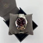 Bulova 98B422 Men's Automatic Watch Red Dial Stainless Steel Bracelet 39MM. Fixed Price $249.00.