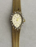 Repair Lady's Amintron Watch Gold Color Vintage White Face Diamond Chips. Fixed Price $13.50.