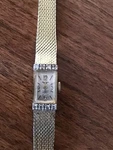 Helzberg Wrist Watch 10K Gold Filled 8 Diamonds 1960. Fixed Price $200.00.