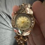 Women Gold Tone Metal Bangle Analog Wristwatch Cream Dial Arabic Numerals. Fixed Price $293.00.