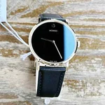 Movado Swiss Museum Classic Black Dial Men's Gold Slim Leather Strap Watch. Fixed Price $339.00.