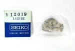 Seiko 112019 7005A Barrel And Train Wheel Bridge, Nos Sealed Orig. Pkg. Fixed Price $15.00.