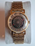Collectors Watch: Gold-plated Vintage Ernest Borel Skeleton Kaleidoscope. Fixed Price $503.81.