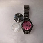 E. Gluck Women's Silver Tone Watch - Pink Dial Model 78/1001. Fixed Price $24.90.