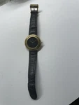 Fendi, Men, Gold Plate, Black Leather Band, Background. Fixed Price $152.00.