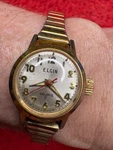 Vintage Elgin Galaxie 17 Jewel Mechanical Watch Gold Tone Red Seconds Hand. Fixed Price $39.99.