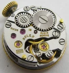 Rolex 1400 Watch Movement & Gold Dial 18 Jewels For Project / Parts. Fixed Price $450.00.