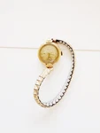 Vintage Croton Mechanical Ladies Watch 21MM 12K Gold Filled Runs Swiss Style. Fixed Price $41.00.