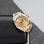 Rolex 16013 Champagne Dial 1986. Fixed Price $6300.00.