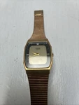 Vintage Pulsar Y480 7210 2ND0644 Gold Tone Stainless Steel Band Quartz Watch. Fixed Price $55.98.