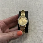 Ladies Movado Bold Champagne Dial Gold-tone Diamond Bezel Watch. Fixed Price $895.00.
