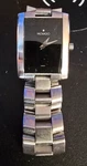 Movado Women's Eliro Stainless Steel Silver Swiss Rectangle Watch For Parts. Fixed Price $129.99.