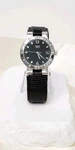 Movado Vizio Women's Quartz Watch Black Dial, Diamond Bezel, Leather Band Read. Fixed Price $330.00.