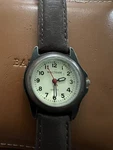 Waltham Ladies 28MM Silver Case Cream Dial Black Numerals Brown Leather Strap. Fixed Price $15.35.
