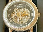 Andre' Giroud Skeleton Automatic Watch Gold Tone Romaan Dial Exhibition Back. Fixed Price $99.00.