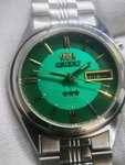 Vtg Orient Tristar Crystal 3 EM4J-CO Ca Green Dial Men Automatic Watch. Fixed Price $70.00.