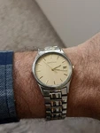 Elegant Vintage Certina Quart Watch With Gold Dial, Date Display, Steel Band. Fixed Price $135.00.