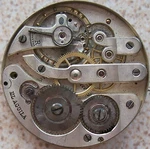 El Aguila Pocket Watch Movement & Dial 43 Mm. In Diameter Balance Broken. Fixed Price $75.00.