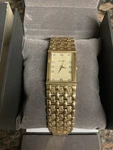 Bulova Watch- Gold & Diamond Embellishment- Model 97F52- Previously Owned. Fixed Price $245.00.