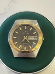 Vintage Baylor Two Tone Wood Grain Dial Automatic 36MM Watch Eta 2789-1 Movement. Fixed Price $72.00.
