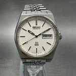 Seiko Sq 100 Watch Men 34MM White Dial Silver Tone Read Daydate 6923-8019 Newbat. Fixed Price $67.99.