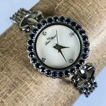 Lucien Piccard Women 26910SAP White Mop Dial Blue Crystals Bezel Quartz Watch 6". Fixed Price $48.73.