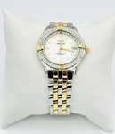 Breitling Perpetuel Sirius 18K/SS Quartz B62021. Fixed Price $3800.00.