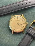 Universal Geneve Golden Shadow 18K Solid Automatic Watch Cal 1-66. Fixed Price $1750.00.