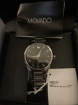 Movado Silver Watch With Sapphire Crystal. Fixed Price $800.00.