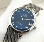 Universal White Shadow Genta Design Cal. 2-67 Micro-rotor Blue Dial. Fixed Price $1800.00.