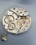Piaget Swiss Watch Movement 7000025 18 Jewels Blue Cabochon Not Running. Fixed Price $325.00.