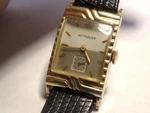 Wittnauer 10K Ygf Tanq Watch 38MM X 21MM W/ Curved Scalloped Bezel 9WN. Fixed Price $389.00.