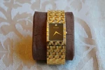 Wittnauer CE8507 Gold Tone Rectangle Black Dial Diamond Swiss Quartz Watch. Fixed Price $185.00.
