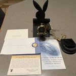 Franklin Mint Playboy Collector Pocket Watch Gold W/ Box, Papers, Chain, Stand. Fixed Price $325.00.