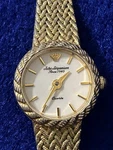 Jules Jurgenson Quartz Ladies Gold Tone Watch Stainless Steel Clasp Adjustable. Fixed Price $25.00.
