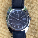 Vintage 1976 Timex Viscount Date - Mens Automatic Gray Green Camo Dial Watch. Fixed Price $85.00.