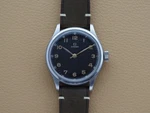 Omega Gilt Lacquered Black Dial Ref 2179/3 Cal 30T2 Center Seconds 1947 35MM. Fixed Price $2950.00.