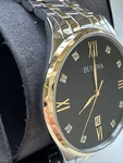 Bulova Men's Classic Quartz Calendar Slim Movement Silver Watch 40 98D130. Fixed Price $206.98.